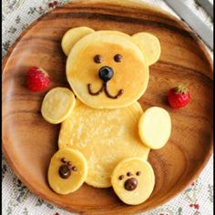 a teddy bear made out of fruit on a plate