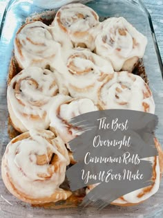 cinnamon rolls with icing in a glass baking dish on a blue tablecloth and text overlay that reads the post overnight cinnamon rolls you'll never make