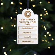 a wooden ornament hanging from a christmas tree