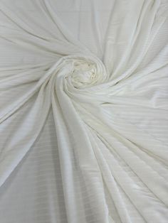 the white fabric is very soft and drapy