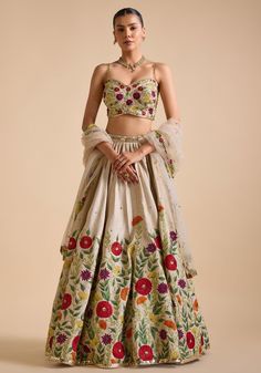 Ivory Floral Embroidered Lehenga set Prevasu - Fabilicious Fashion Embroidered Lehenga Choli, Hand Embroidered Lehenga, Embroidery Patterns Indian, Modern Lehengas, Ivory Bridal Lehenga, Patchwork Lehenga, Floral Bridal Lehenga, Floral Lengha, Wedding Catalog