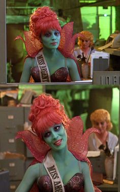 two pictures of a woman with red hair and green makeup, one is wearing a tiara