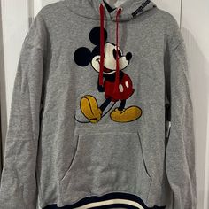 New Hoodie Mickey Mouse . Size Small, Lenght 26” X 21” Aprox Unisex Mickey Mouse Sweatshirt For Winter Streetwear, Mickey Mouse Long Sleeve Sweatshirt For Fall, Casual Mickey Mouse Sweatshirt For Winter, Casual Cotton Mickey Mouse Sweatshirt, Casual Mickey Mouse Tops For Winter, Casual Long Sleeve Mickey Mouse Sweatshirt, Mickey Mouse Long Sleeve Sweatshirt For Streetwear, Long Sleeve Mickey Mouse Sweatshirt For Streetwear, Fall Mickey Mouse Sweatshirt For Streetwear