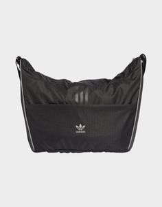 Practical and stylish. This adidas shopper bag has a spacious main compartment and front zip pocket that provide plenty of room for your essentials. Made from a master mix of ripstop and metallic mesh, it features reflective details to stand out from the crowd. This product is made with at least 50% recycled materials. By reusing materials that have already been created, adidas help to reduce waste and our reliance on finite resources and reduce the footprint of the products adidas make.• Dimensions: 12 cm x 50 cm x 39 cm• Volume: 21.5 L• 100% polyester (recycled)• Zip main compartment• Front zip pocket• Reflective details Metallic Mesh, Football Training, Football Kits, Reduce Waste, Buy Now Pay Later, Football Boots, Jd Sports, Shopper Bag, Adidas Nike