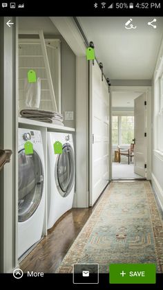 a washer and dryer are in the hallway