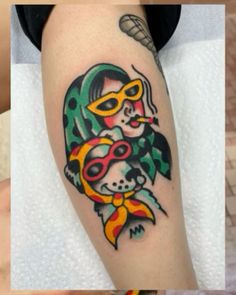 three different pictures of tattoos on the arm and leg, one with a dog wearing a mask