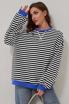 Material:95%Cotton+5%Elastane • Effortlessly chic, this oversized pullover in a serene sky blue hue is perfect for a relaxed day out or cozy nights in, exuding a laid-back yet stylish vibe. • The striking stripe design adds a touch of playfulness to the overall look, making it a versatile piece that can be dressed up or down with ease. • Stand out with the contrasting edge detail that frames the pullover, giving it a modern twist that elevates any casual outfit effortlessly. • Enjoy the comfort Jeans Overall, Women Sweatshirt, Jeans Cargo, Pink And White Stripes, Maxi Robes, Oversized Pullover, Yoga Shorts, Denim Jumpsuit, Pink Stripes