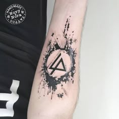 a person with a tattoo on their arm