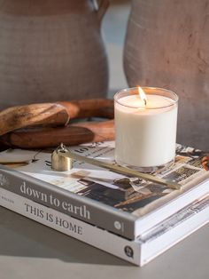 a candle sitting on top of a book