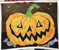 a painting of a jack - o'- lantern pumpkin on a piece of paper