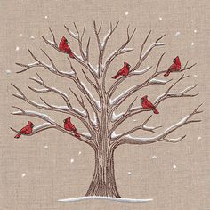 a tree with red birds sitting on it in the middle of snow covered ground next to a light brown background