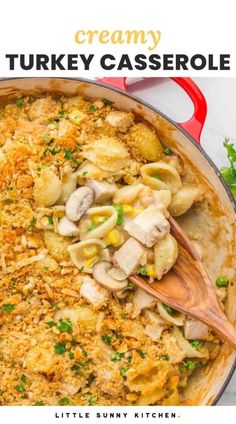 creamy turkey casserole in a pan with wooden spoon and parsley on the side