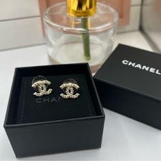 Great Preowned Condition. Approximately The Size Of A Dime. The Pearls Make This Classic And Sophisticated. Perfect Size And Goes With Everything. Gold In Color. Comes With Chanel Box Only. I Loved These, But Bought As A Birthday Gift For My Mom And She Picked A Different Chanel Pair! Reposhing This Item I Purchased From @Mleeluxe And Therefore, They Are Already Authenticated And In The Same Box. Selling Them For The Same Price I Paid For Them. Questions? Leave A Comment Below! Channel Earrings, Chanel Stud Earrings, Lirika Matoshi, Chanel Jewelry Earrings, Jewelry Chanel, Chanel Box, Plastic Earrings, For My Mom, Chanel Earrings