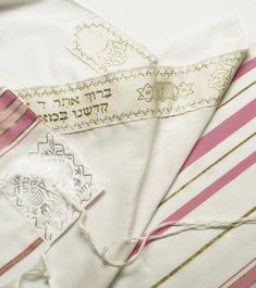 Material: Acrylic Made in Israel The acrylic prayer shawls are woven from man-made fabric as a successfully substitute for wool yarns to produce an inexpensive prayer shawl, at a reasonable price. The finishing process of Talitnia's acrylic prayer shawls is identical to that of the prestigious woolen shawls and is designed to create a high quality and durable tallit for many years to come. Jewish Prayer, Judaica Gifts, Bat Mitzvah Gifts, Prayer Shawl, Jewish Gifts, Acrylic Fabric, Gold Stripes, Bat Mitzvah, Synthetic Fabric