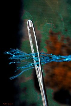 a close up of a toothbrush with water on it