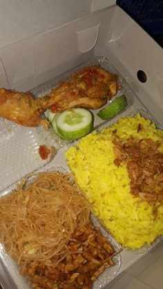 an open box filled with different types of food