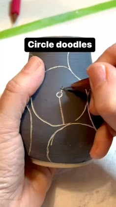 a person is working on some kind of object with the words circle doodles above it