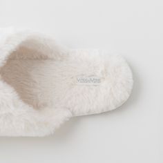 DESCRIPTION Wrap your feet in luxury with Mrs Fluffy Slippers. These beautiful ivory-colored slippers feature adorable MRS embroidery and are crafted with the softest material for ultimate comfort. Elevate your honeymoon experience with these cozy fluffy companions SIZING S: 36-37 US M: 38-39 US L: 40-41 US XL: 42-43 US MATERIALS Faux Fur TPR Sole White Casual Slippers With Soft Texture, Casual White Slippers With Soft Texture, Comfy Cream Slippers With Cushioned Footbed, White Super Soft Slippers For Loungewear, Comfy Soft Cream Slippers, Comfortable White Slippers For Loungewear, Comfortable White Loungewear Slippers, White Super Soft Comfy Slippers, Cozy White Slippers For Loungewear