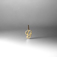 A timeless piece that will never go out of style. This 14K gold calligraphy pendant is the perfect and most stunning way of keeping a name close to your heart. We handmade each piece so you can assure you're getting a one-of-a-kind pendant that is not like any other. This 14K solid gold letter pendant is flawlessly crafted to look super chic and elegant around your neck. Pair it with a nice gold chain and wear it with almost all of your outfits. The piece is such a versatile lettering necklace. G Initial, G Necklace, Gold Letter Pendants, Initial G, Gold Calligraphy, Gold G, Gold Letter, Calligraphy Letters, Letter G