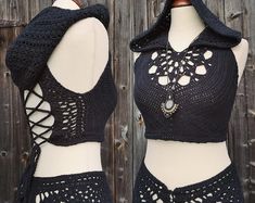 a woman's crop top with crochet on the back and hoodie