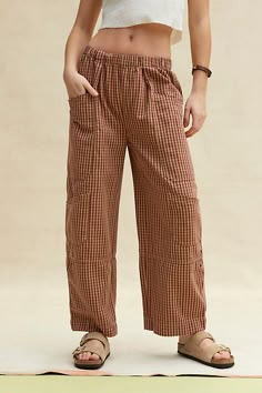 BDG pants crafted from a cotton canvas fabric with an allover gingham print. Cut in an easy fit with a low-rise and a loose wide-leg. Finished with oversized patch pockets at the sides. Only available at UO. Features BDG Charlie gingham wide-leg pant Cotton wide-leg pant Lightweight gingham print fabric Low-rise elasticated waistband Cargo-style front pockets Back buckle detail and welt pockets Low rise wide-leg fit Full length Easy pull-on style UO exclusive Content + Care 100% Cotton Machine w Cool Comfy Pants, Vintage Fall Fashion 70s, Cute Wide Leg Pants, Cute Flowy Pants, Woman’s Pants, Eclectic Grandpa Fashion, Comfy Pants Outfit, Patterned Pants Outfit, Hippie Street Style