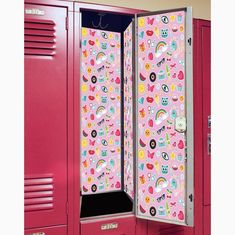 a pink locker with lots of stickers on the doors and drawers in front of it