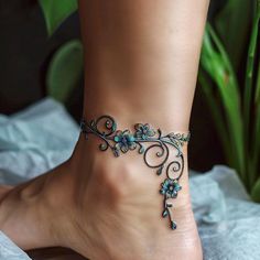 Semper Fidelis Tattoo Women, Floral Wrist Tattoo Bracelets, Women Back Tattoos Full, Dragonfly Tattoo Ankle, Cute Floral Tattoos, Ankle Bracelet Tattoos For Women, Strong Meaning Tattoos For Women, Western Arm Tattoos For Women, Tattoo Ankle Bracelet