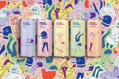 three different types of body sprays on a colorful background with cartoon characters in the background