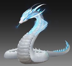 a white and blue dragon statue sitting on top of a gray surface with its mouth open