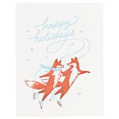 a card with two foxes flying in the air and happy holidays written on it's side