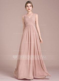 a woman in a long pink dress