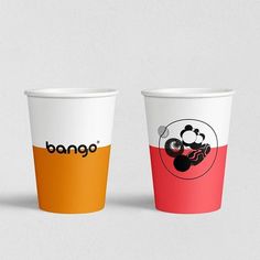 two paper cups with different designs on them