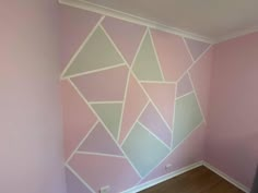 an empty room painted in pastel colors