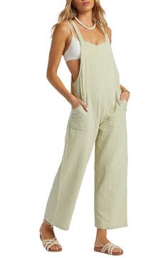 Embrace the ease and versatility of one-and-done comfort with this lightweight cotton-gauze jumpsuit cut with breezy straight legs. Adjustable straps close at the back for a personalized fit with every wear. 47" center front length; 26 1/2" inseam; 20" leg opening (size Medium) Back button closure Square neck Adjustable straps Front slant pockets 100% cotton Machine wash, line dry Imported Gauze Jumpsuit, Moroccan Oil Hair, Pocket Jumpsuit, Long Sleeve Outerwear, Green Jumpsuit, Streetwear Women, Short Sleeved Sweaters, Streetwear Outfit, Dungarees