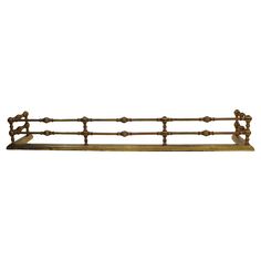 an old wooden shelf with iron bars on the top and bottom, against a white background