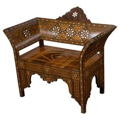 a wooden bench with intricate carvings on it