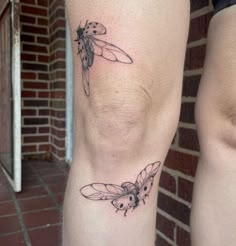 two tattoos on the legs of people with bugs and moths tattooed on them, one is black and white