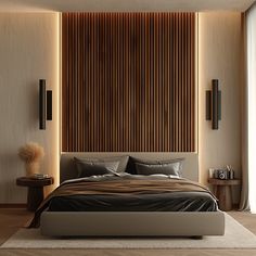 a large bed sitting in the middle of a bedroom next to a wall with wooden slats on it