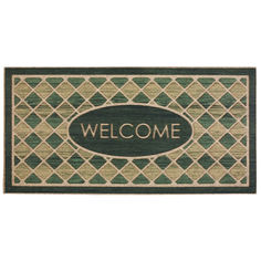 a welcome mat with the words welcome in black and green on it, next to a white background