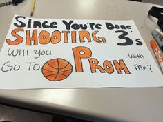 a sign that says, since you're done shooting 3s will you go to prom?