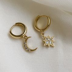 Brand New To Our In House Collection! Features A Sterling Silver 925 Stamp, Small Huggie Hoops With Mismatched Dangling Northern Star On One, Moon On The Other, And Covered With Tiny Cz Diamonds. See Final Photo For Size Comparison. Comes With Little Gift Box. 3908 Everyday Celestial Style Pierced Hoop Earrings, Celestial Hoop Earrings Tarnish Resistant, Celestial Style Everyday Hoop Earrings, Celestial Hoop Earrings With Ear Wire, Dainty Huggie Earrings With Moon Charm, Celestial Tarnish Resistant Hoop Earrings, Moon Charm Huggie Earrings For Gift, Huggie Earrings With Moon Charm Gift, Everyday Celestial Star Hoop Earrings