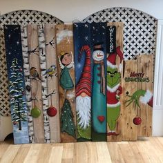 several wooden boards with christmas decorations on them