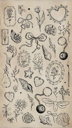 an old paper with various decorative items on the page, including flowers and other things