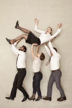 four people are standing in the shape of a man and woman