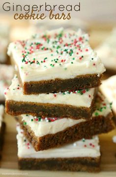 several pieces of cake with white frosting and sprinkles