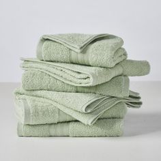 stack of folded towels on white background