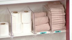 several rolls of toilet paper are on the shelf