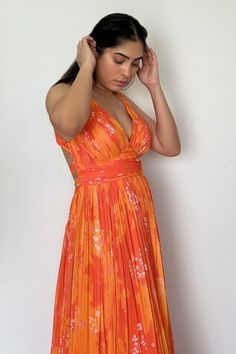 Yellow and orange ruched maxi dress with floral and leaf print. - Aza Fashions Orange Halter Neck Maxi Dress For Evening, Orange Halter Neck Dress For Cocktail, Summer Cocktail Maxi Dress, Orange Evening Maxi Dress, Fitted Orange Sundress Maxi Dress, Elegant Orange Halter Neck Maxi Dress, Fitted Orange Ruched Maxi Dress, Fitted Ruched Orange Maxi Dress, Orange Sleeveless Maxi Dress For Evening