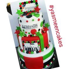 three tiered cake decorated with christmas decorations