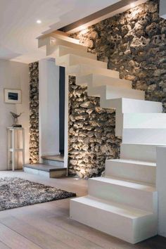 an ad for pin to win $ 500 gift card with stone wall and stairs